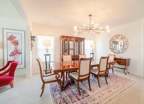 Vintage Dining Updated with Contemporary Lighting and Accessories