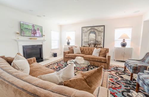 Cozy Family Room with Cocoa Couches from Bernhardt and Touches of Blue and Gold